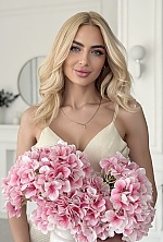 Ukrainian mail order bride Diana from Kharkiv with blonde hair and green eye color - image 2