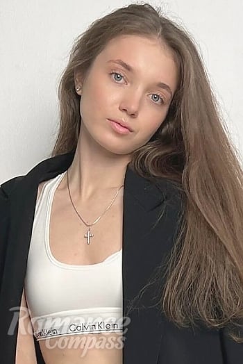 Ukrainian mail order bride Kateryna from Odesa with light brown hair and blue eye color - image 1