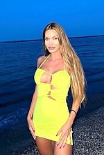 Ukrainian mail order bride Tanya from Baia Mare with light brown hair and green eye color - image 6