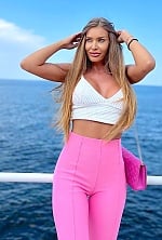 Ukrainian mail order bride Tanya from Baia Mare with light brown hair and green eye color - image 3