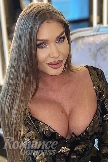 Ukrainian mail order bride Tanya from Baia Mare with light brown hair and green eye color - image 1