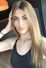 Ukrainian mail order bride Diana from Kyiv with blonde hair and blue eye color - image 8