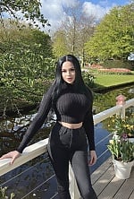 Ukrainian mail order bride Vera from Kyiv with black hair and brown eye color - image 9