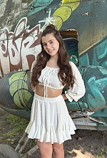 Ukrainian mail order bride Viktoriia from Ivano-Frankivsk with brunette hair and brown eye color - image 23