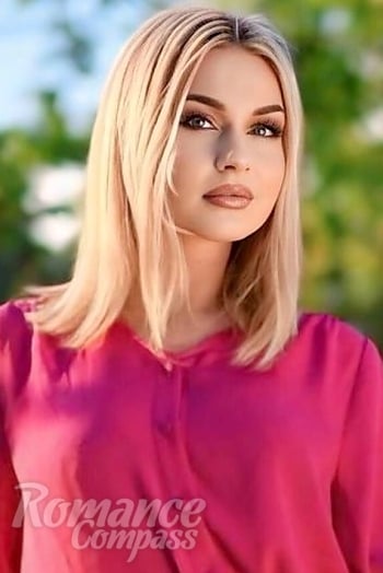 Ukrainian mail order bride Anna from Chisinau with blonde hair and blue eye color - image 1