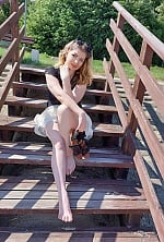 Ukrainian mail order bride Oksana from Sandomierz with light brown hair and green eye color - image 6