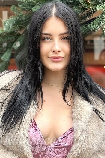 Ukrainian mail order bride Polina from Ivano-Frankivsk with black hair and green eye color - image 1