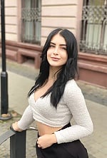 Ukrainian mail order bride Polina from Ivano-Frankivsk with black hair and green eye color - image 4