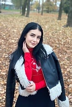 Ukrainian mail order bride Polina from Ivano-Frankivsk with black hair and green eye color - image 5