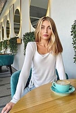 Ukrainian mail order bride Anastasia from Lviv with blonde hair and green eye color - image 5