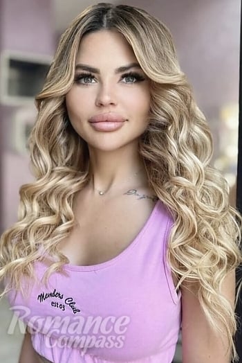 Ukrainian mail order bride Yulia from Kyiv with blonde hair and blue eye color - image 1