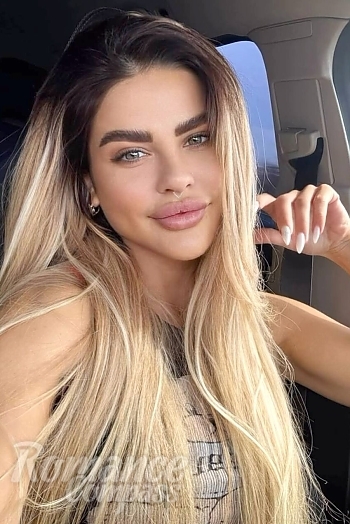 Ukrainian mail order bride Yulia from Kyiv with blonde hair and blue eye color - image 1