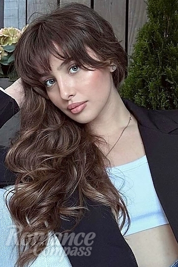 Ukrainian mail order bride Diana from Lviv with light brown hair and blue eye color - image 1