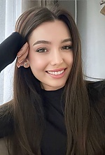 Ukrainian mail order bride Daria from Kyiv with black hair and green eye color - image 6