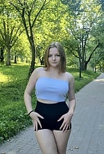 Ukrainian mail order bride Renata from Rivne with light brown hair and green eye color - image 11