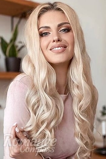 Ukrainian mail order bride Kristina from Irpin with blonde hair and blue eye color - image 1