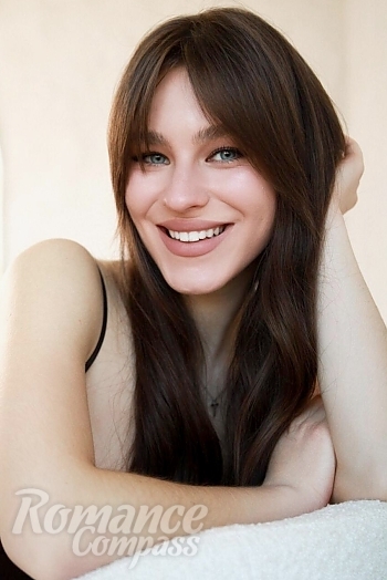 Ukrainian mail order bride Polina from Ternopil with brunette hair and blue eye color - image 1