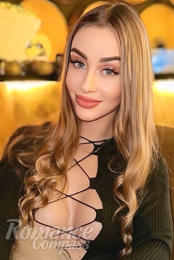 Ukrainian mail order bride Marina from Odesa with light brown hair and green eye color - image 1