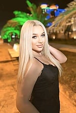 Ukrainian mail order bride Nicoletta from Madrid with blonde hair and green eye color - image 7