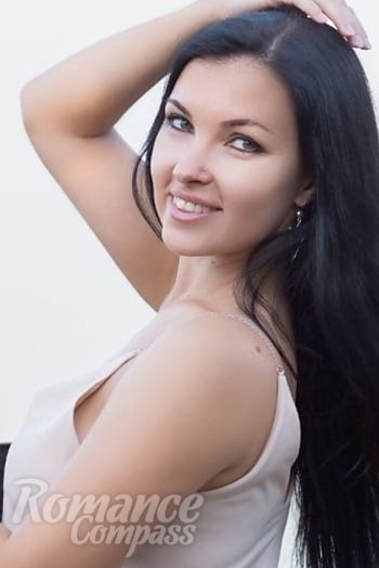 Ukrainian mail order bride Elena from Cherkasy with black hair and green eye color - image 1