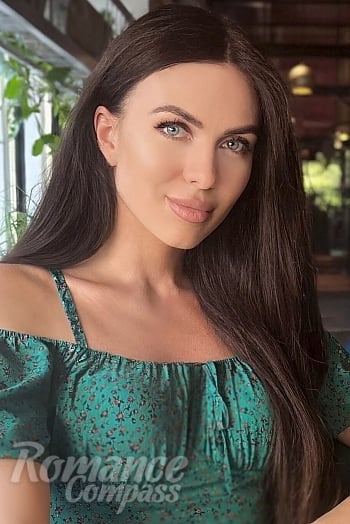 Ukrainian mail order bride Natalia from Kyiv with light brown hair and blue eye color - image 1