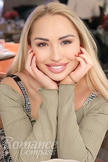 Ukrainian mail order bride Irina from Dubai with blonde hair and brown eye color - image 1