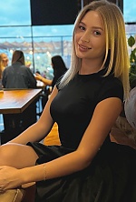 Ukrainian mail order bride Yulia from Lviv with light brown hair and blue eye color - image 4