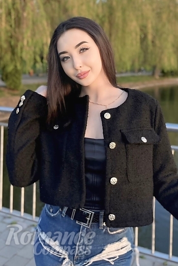 Ukrainian mail order bride Ilona from Ivano-Frankivsk with black hair and green eye color - image 1