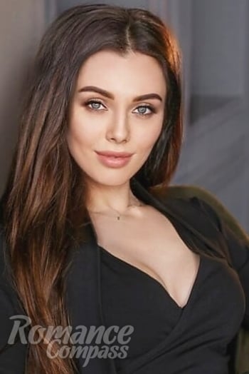 Ukrainian mail order bride Inna from Cherkasy with light brown hair and blue eye color - image 1