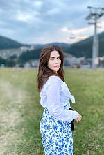 Ukrainian mail order bride Viktoriia from Odesa with light brown hair and blue eye color - image 6