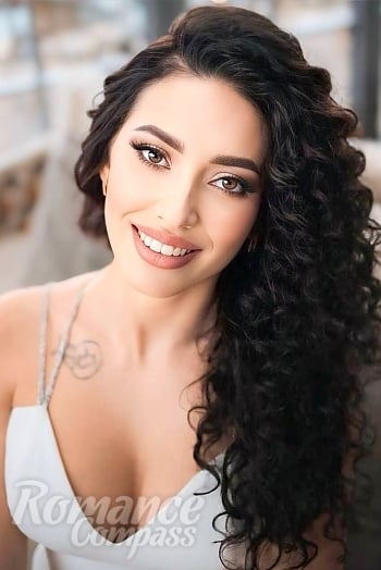 Ukrainian mail order bride Anna from Kryvyi Rih with black hair and hazel eye color - image 1