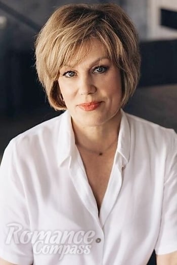 Ukrainian mail order bride Tatyana from Myrhorod with blonde hair and brown eye color - image 1
