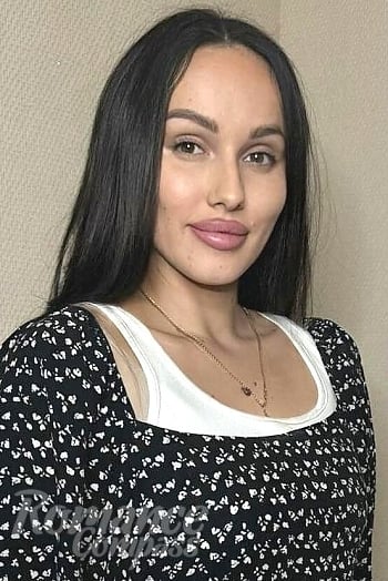 Ukrainian mail order bride Eugenia from Odesa with black hair and hazel eye color - image 1