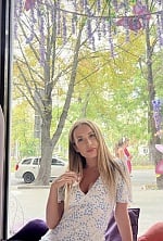 Ukrainian mail order bride Yaroslava from Kyiv with light brown hair and blue eye color - image 8