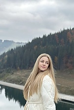 Ukrainian mail order bride Olga from Ivano-Frankivsk with blonde hair and blue eye color - image 11