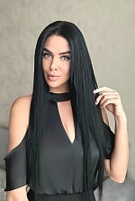 Ukrainian mail order bride Dana from Kyiv with black hair and green eye color - image 8