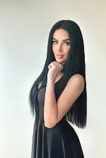 Ukrainian mail order bride Dana from Kyiv with black hair and green eye color - image 13