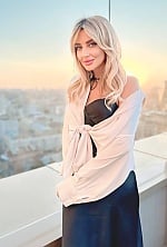 Ukrainian mail order bride Evgenia from Kyiv with blonde hair and grey eye color - image 3