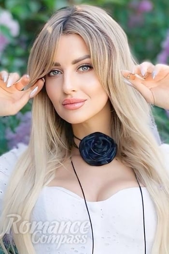 Ukrainian mail order bride Evgenia from Kyiv with blonde hair and grey eye color - image 1