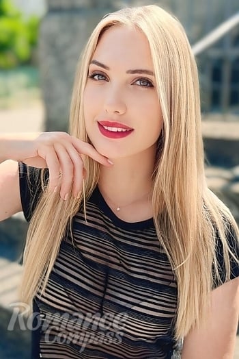 Ukrainian mail order bride Yana from Kyiv with blonde hair and green eye color - image 1