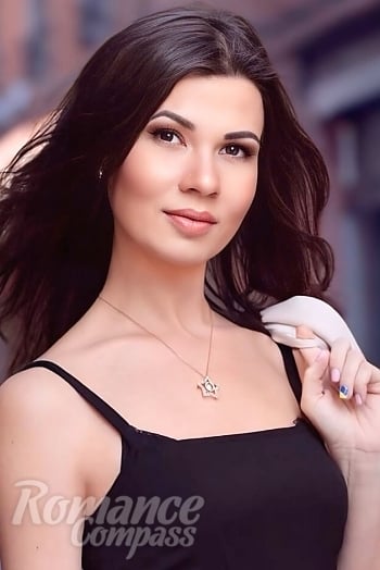 Ukrainian mail order bride Olga from Kyiv with black hair and brown eye color - image 1