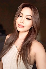 Ukrainian mail order bride Matthana from Bangkok with auburn hair and brown eye color - image 2