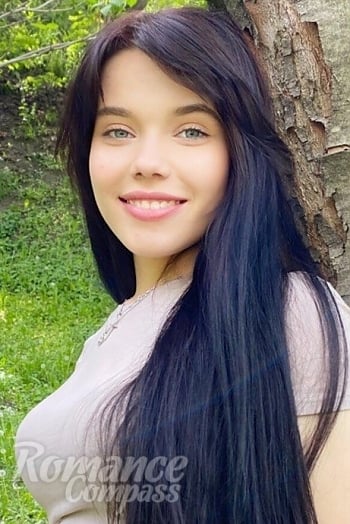 Ukrainian mail order bride Taisa from Cherkasy with black hair and green eye color - image 1