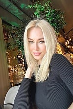 Ukrainian mail order bride Julia from Kyiv with blonde hair and green eye color - image 7