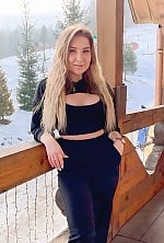 Ukrainian mail order bride Ekaterina from Kyiv with light brown hair and green eye color - image 9