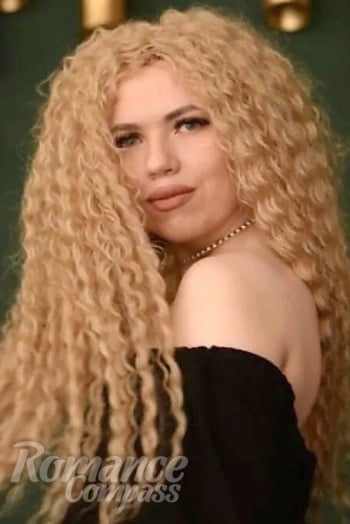 Ukrainian mail order bride Marina from Myrhorod with red hair and blue eye color - image 1