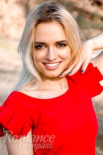 Ukrainian mail order bride Yuliia from Kyiv with blonde hair and brown eye color - image 1