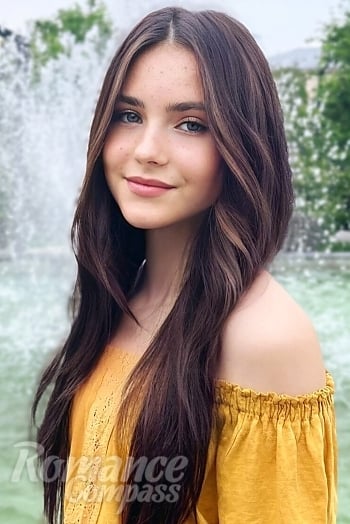 Ukrainian mail order bride Olesia from Cherkasy with black hair and brown eye color - image 1