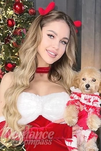 Ukrainian mail order bride Bogdana from Kyiv with light brown hair and blue eye color - image 1