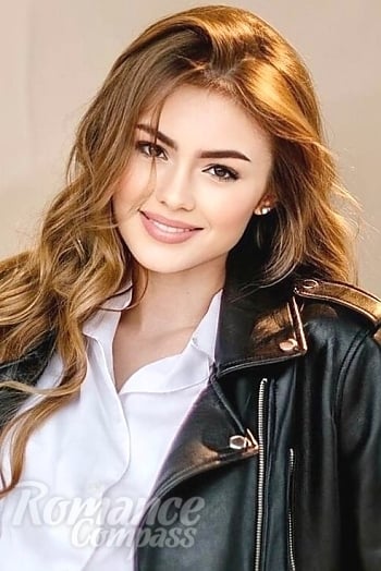 Ukrainian mail order bride Amina from Kyiv with light brown hair and brown eye color - image 1